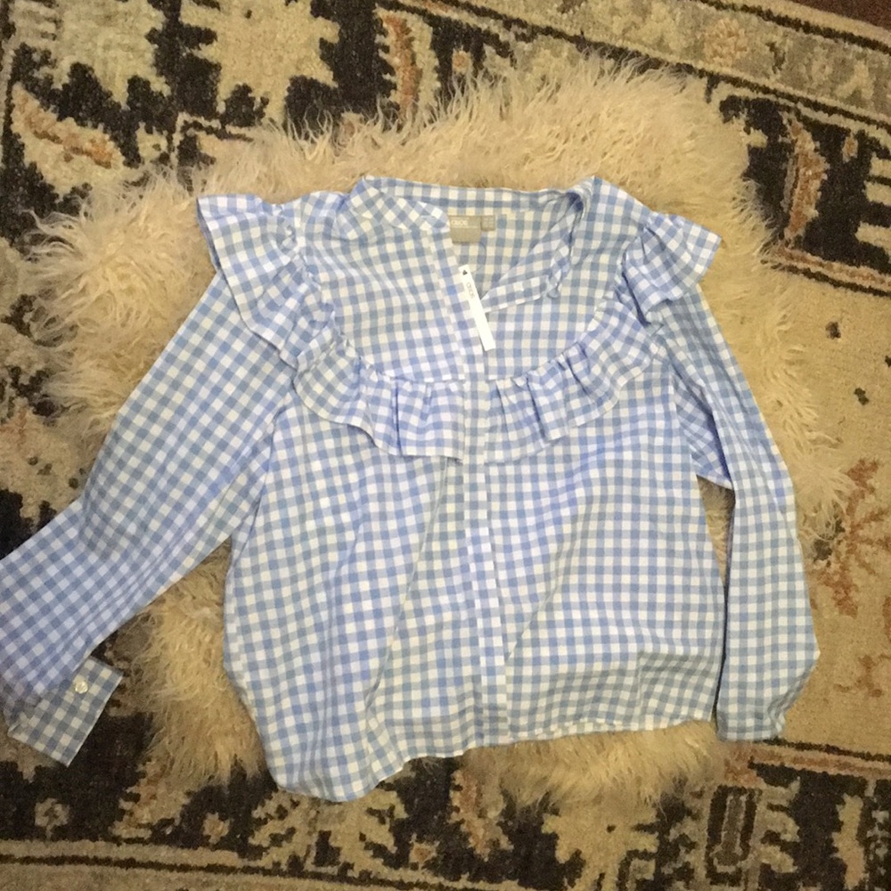 Blue and white blouse with puff sleeves